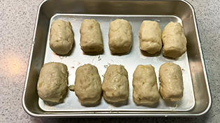 �U�^�Ɋۂ߂Ă���