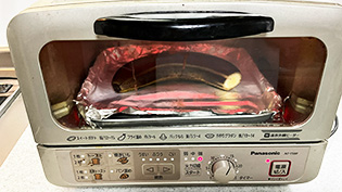 �I�[�u���g�[�X�^�[�i1000W�j��5�`6���Ă��Ă���